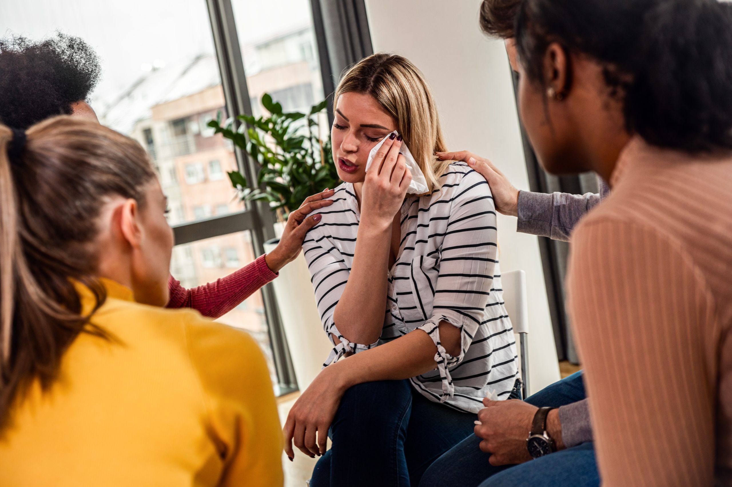 Woman crying during therapy