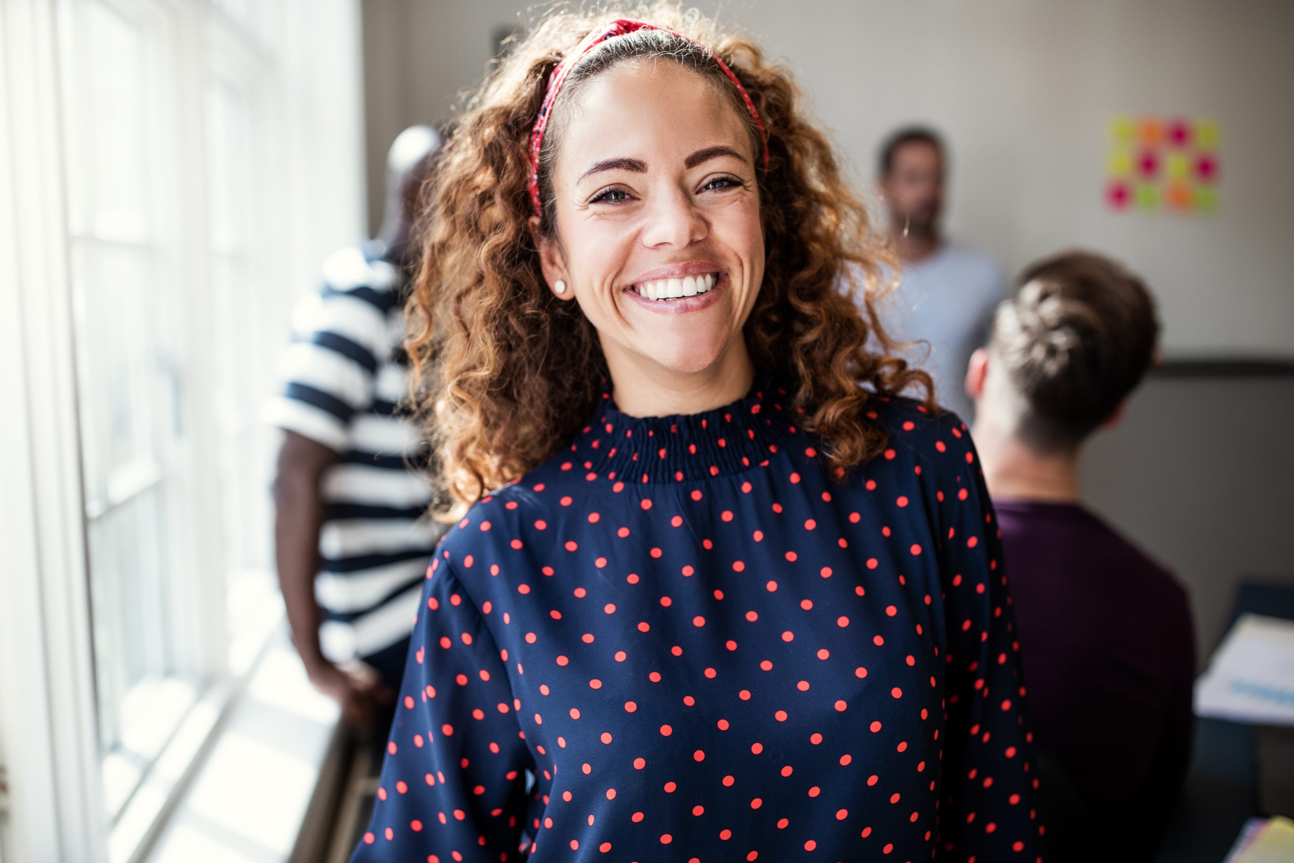 young woman happy at work